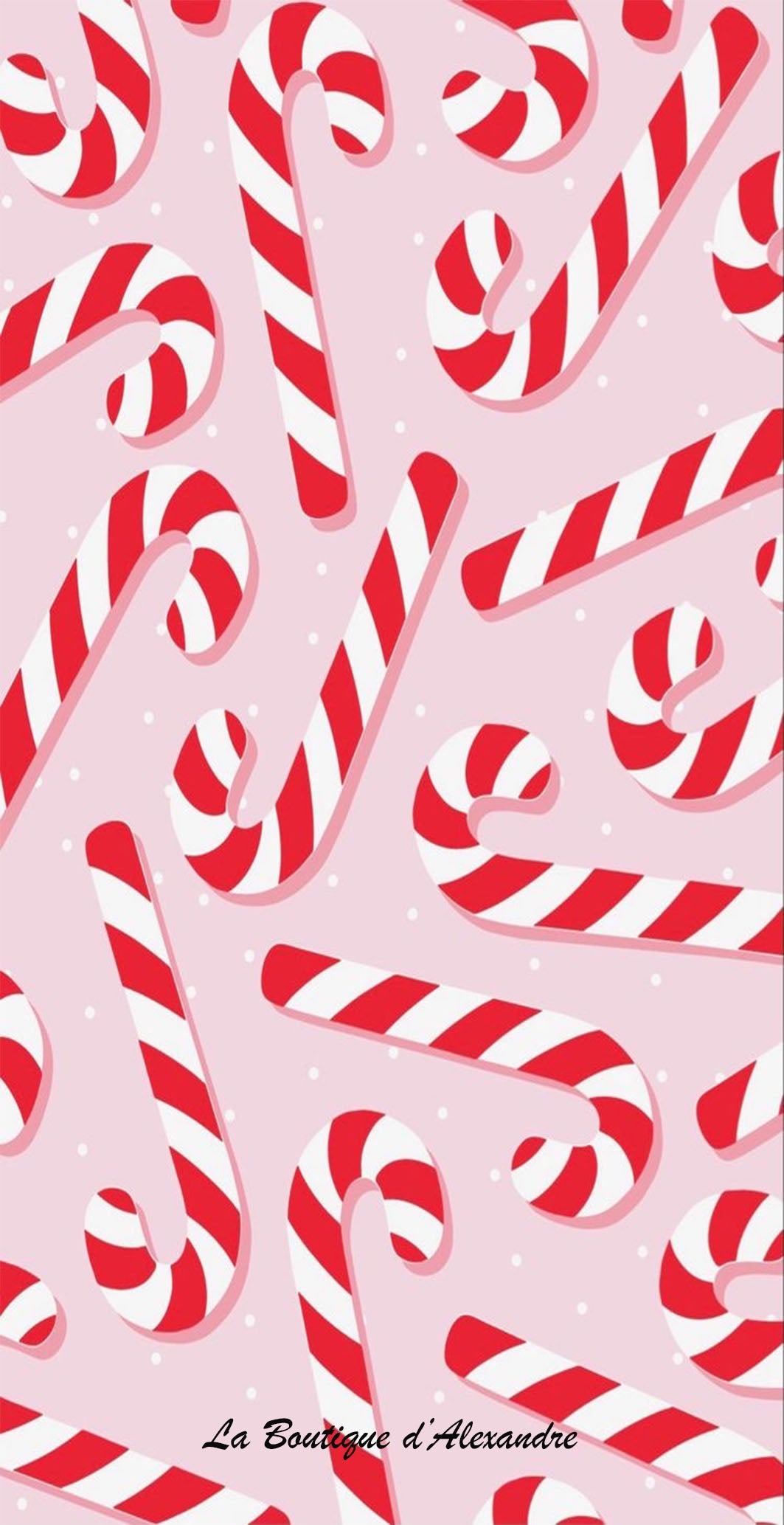 Cannes de noël avec fond rose